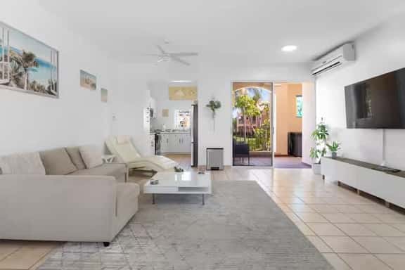 Modern Beach-Bound 2BR with Pool & Scenic Balcony - Image 1